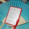 Custom Programs Attached To Silk Fans For The Ceremony