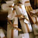 Almond flowers used as embellishments on wedding favors.