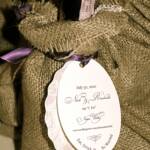 Save The Date! Mini Wine Bottle Favors in Burlap Bags with Custom Save The Date Tags. 